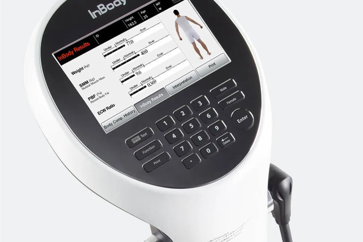 InBody device Close-up of an InBody machine display showing body composition results, keypad, and control buttons.