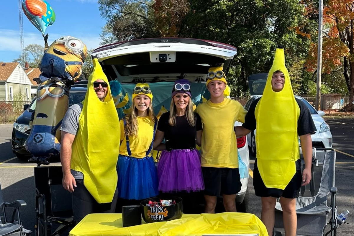 Family dressed as minions and bananas for a trunk or treat event