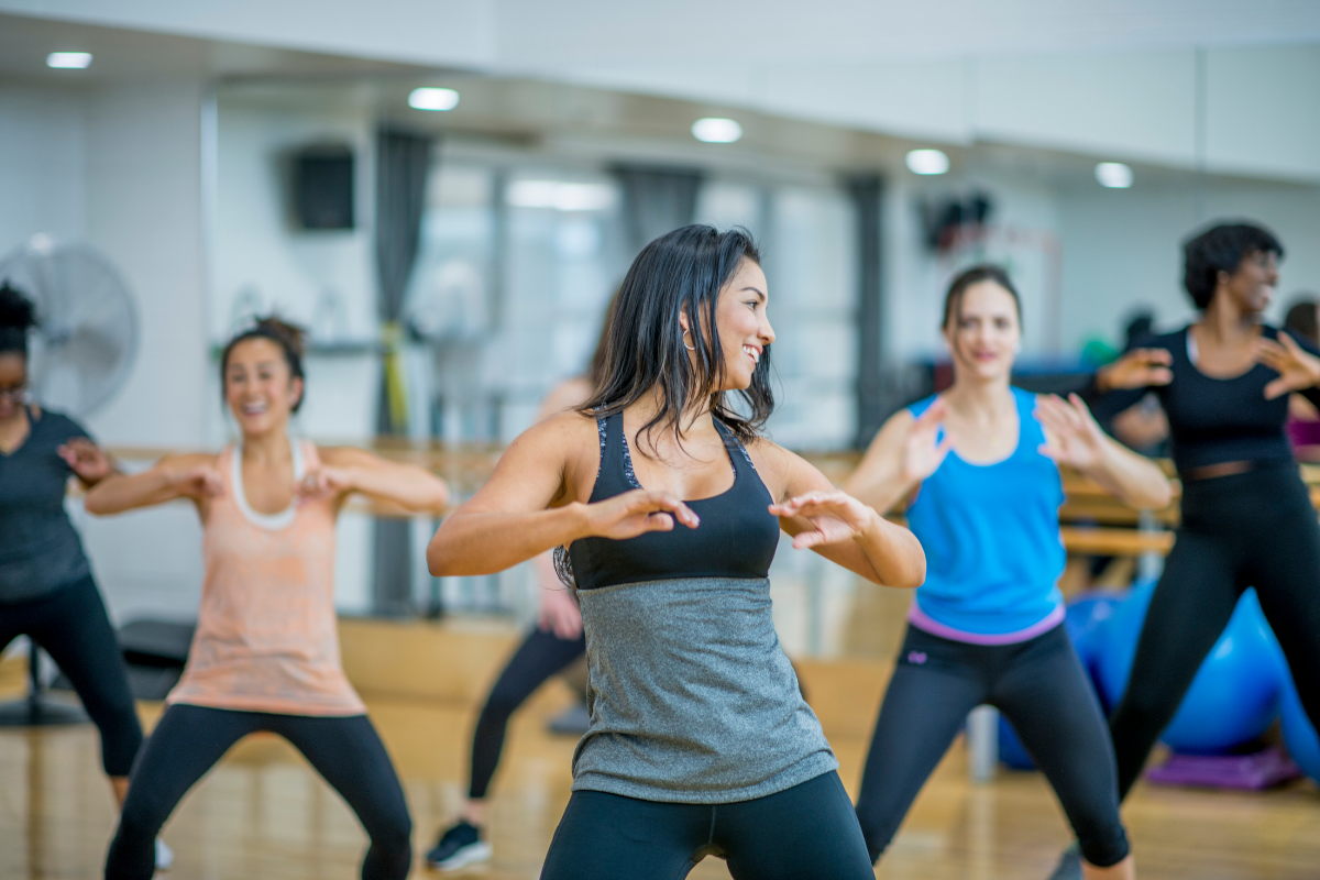 Group of women dancing Zumba in an exercise studio