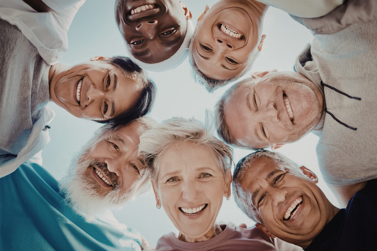 Older adults smiling at the camera